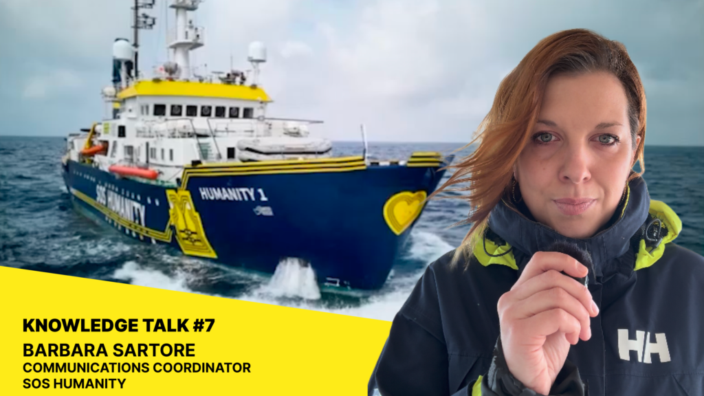 Barbara Sartore in front of vessel Humanity 1